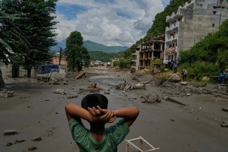 Deadly flash floods in Nepal leave hundreds missing